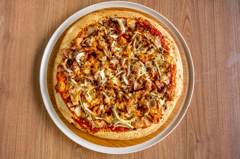 Classic New York Margherita pizza with fresh basil